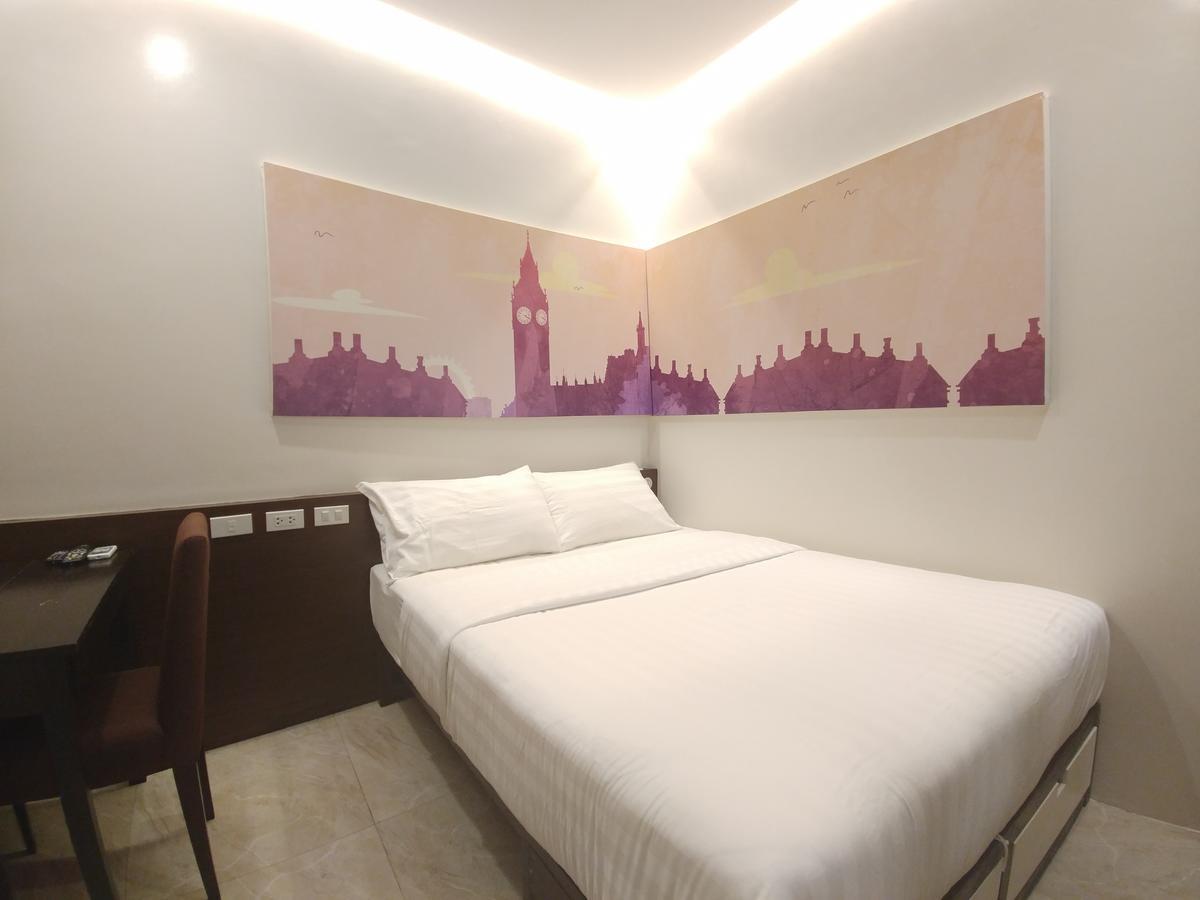 床和浴室服务套房酒店 伊洛伊洛 客房 照片